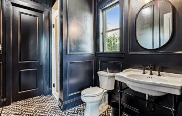 Upscale custom black and white bathroom designed & built by West Custom Homes in Madisonville.